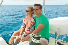 Couple sailing on sea