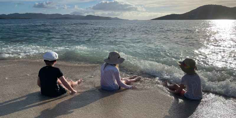 Kids enjoying the beach at Sandy Spit BVI