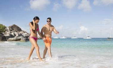 Couple walking on beach