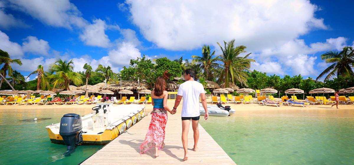Couple walking on dock in St. Martin