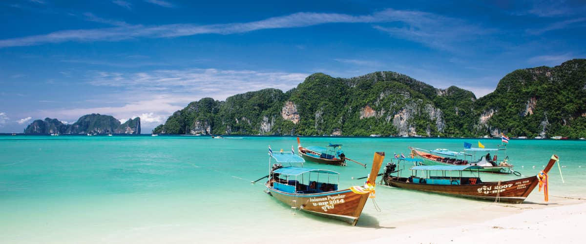 Boats anchored in sea